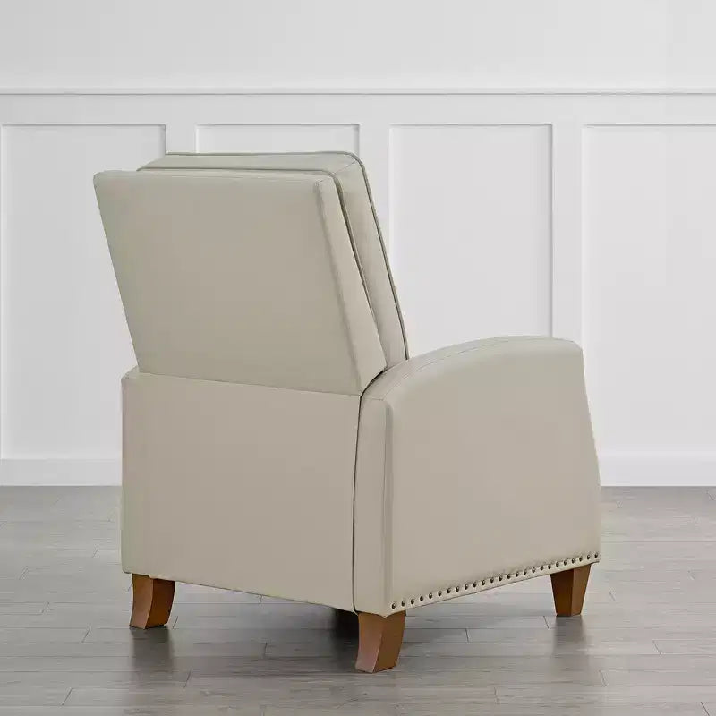 Poltrona reclinabile push-back in similpelle beige / nera / grigio antracite / marrone sella con profili borchiati, posto singolo
