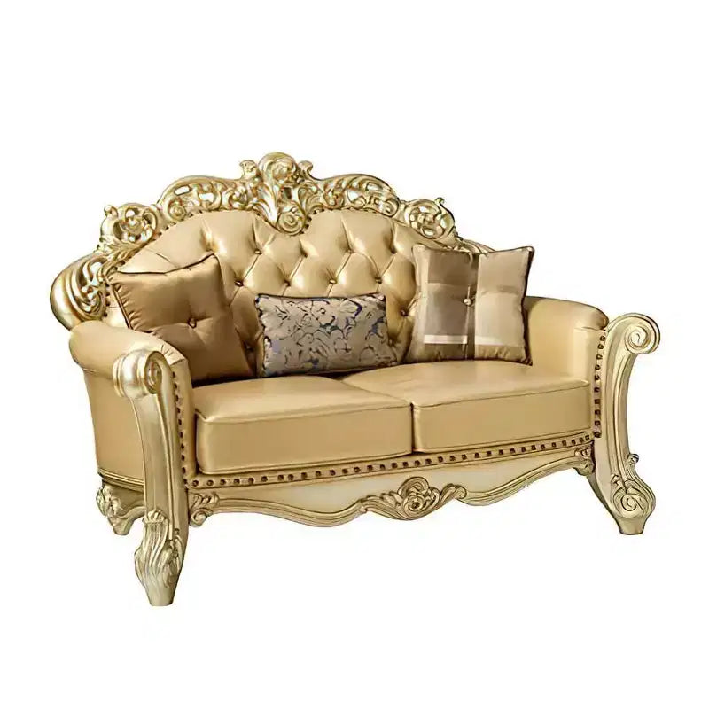 Divanetto 2 posti color osso in similpelle con patina oro, capitonné