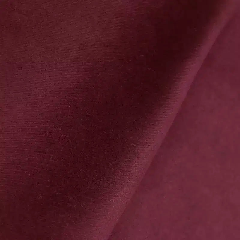 Pouf rotondo a tamburo in velluto con bordo a contrasto, a seduta singola