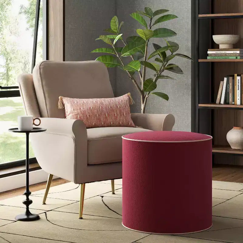 Pouf rotondo a tamburo in velluto con bordo a contrasto, a seduta singola